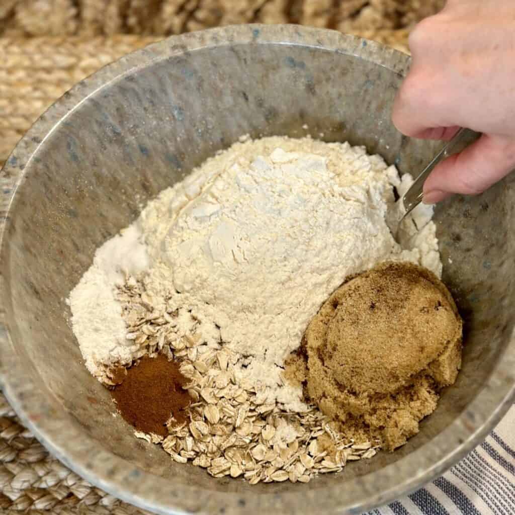 Mixing dry ingredients for muffins. 
