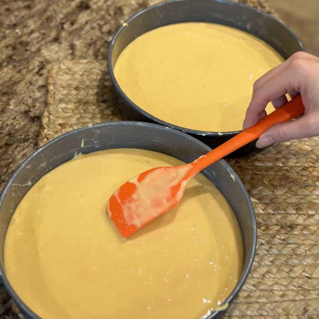 Spreading batter in a cake pan.