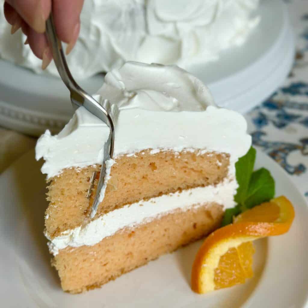 Getting a forkful of dreamsicle cake.