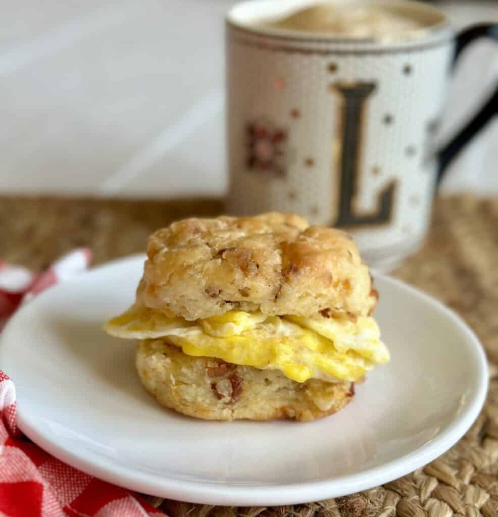 An egg biscuit on a plate.