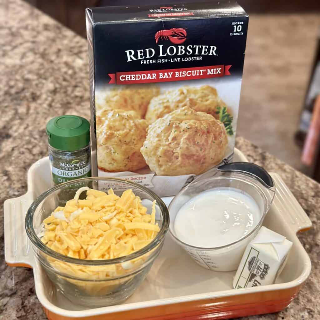 The ingredients to make garlic cheddar biscuits.