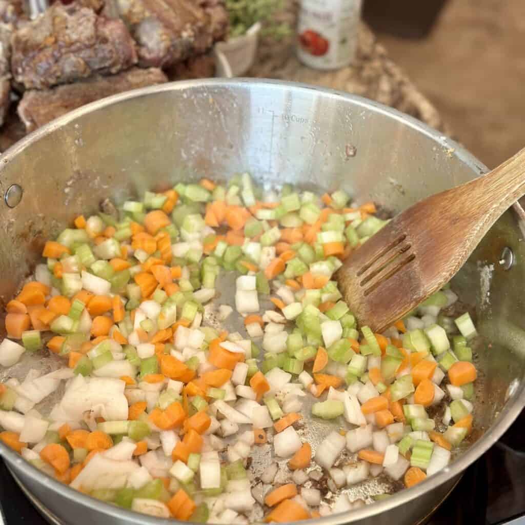 Sautéing vegetables in a skillet.