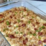 A baking dish of French onion hashbrown casserole.