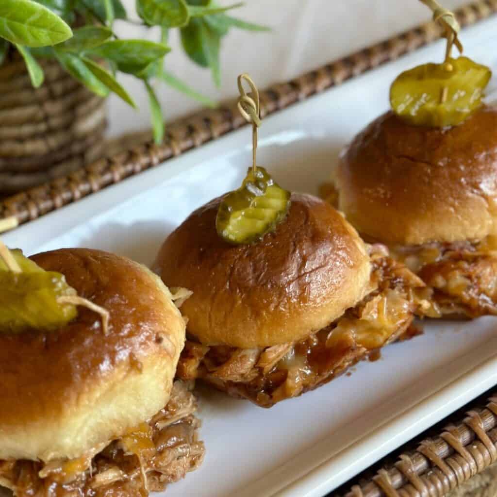 A plate of chicken sliders.