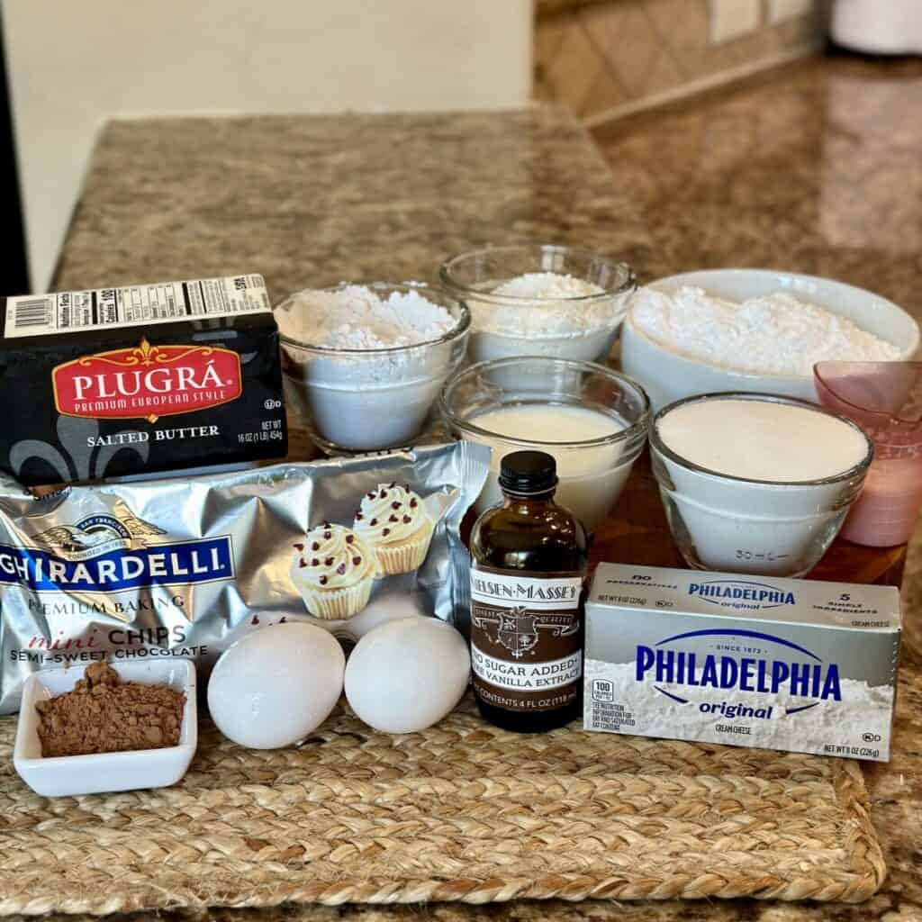 The ingredients to make chocolate chip cupcakes.