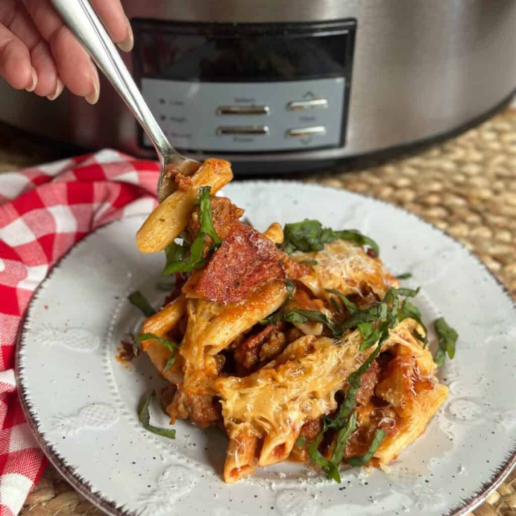 A plate of crockpot pizza casserole.