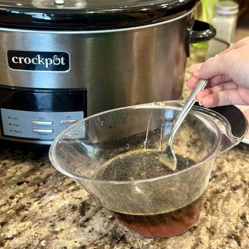 Mixing up sauce for honey garlic chicken.