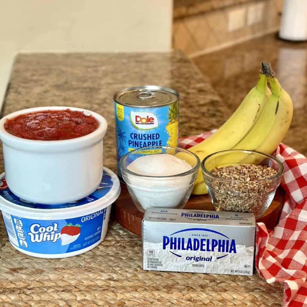 The ingredients to make a frozen fruit salad.