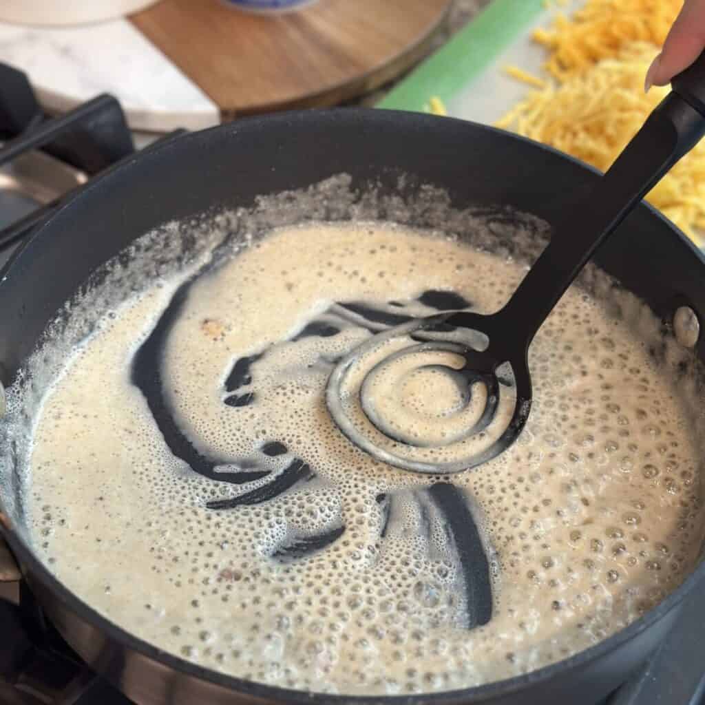 Making a roux in a skillet.