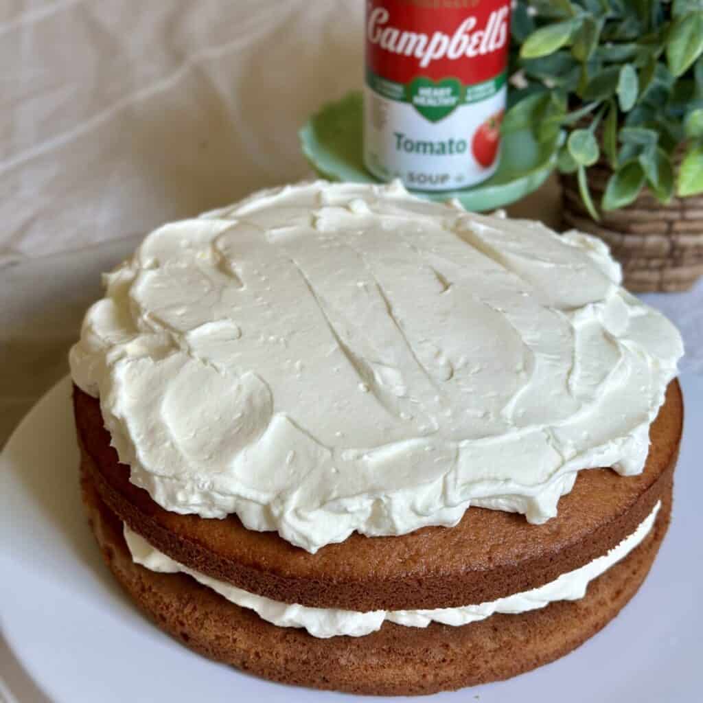 A tomato soup cake on a platter.