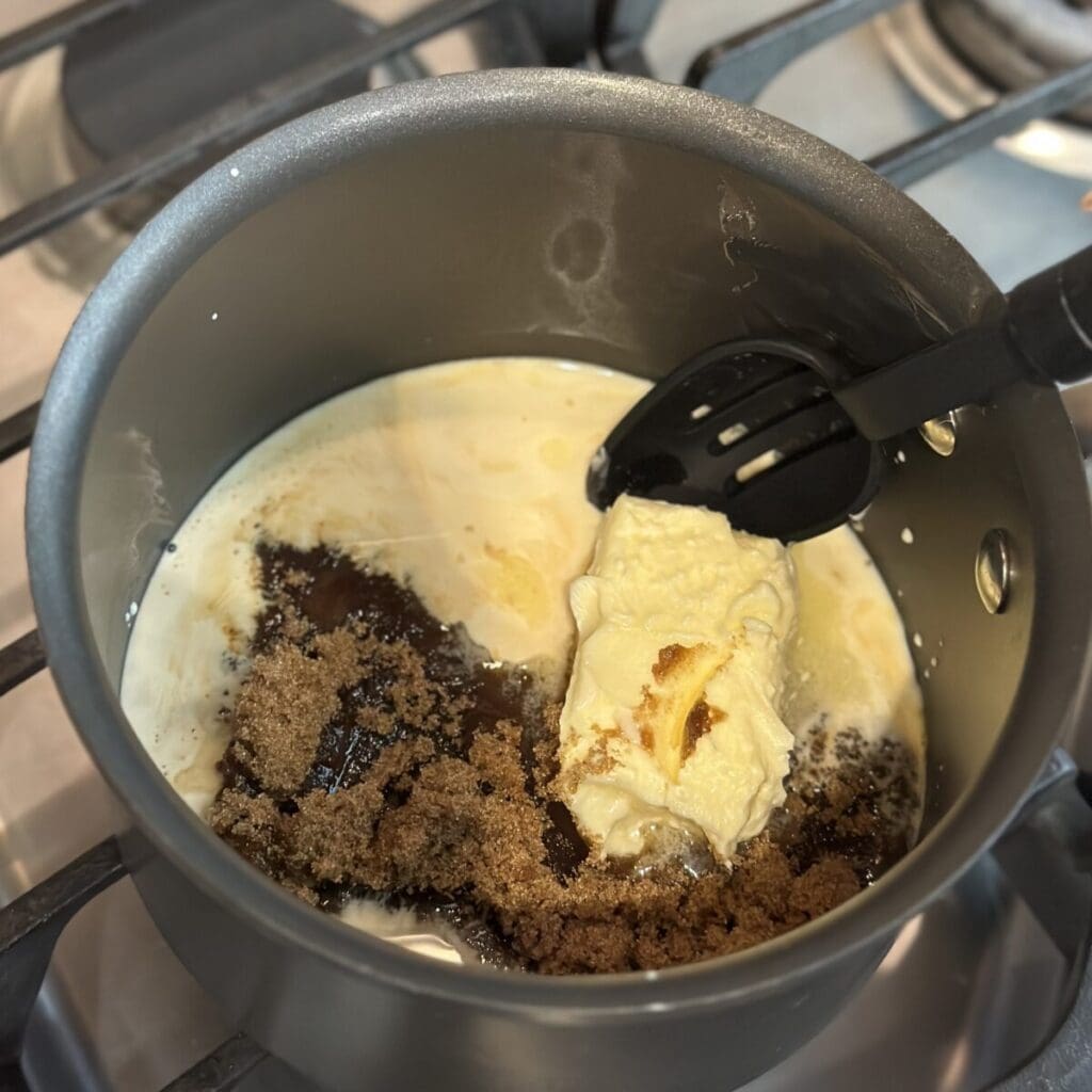 Making the topping in a saucepan for oatmeal cake.