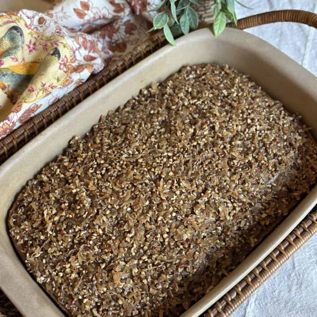 An oatmeal cake in a pan.