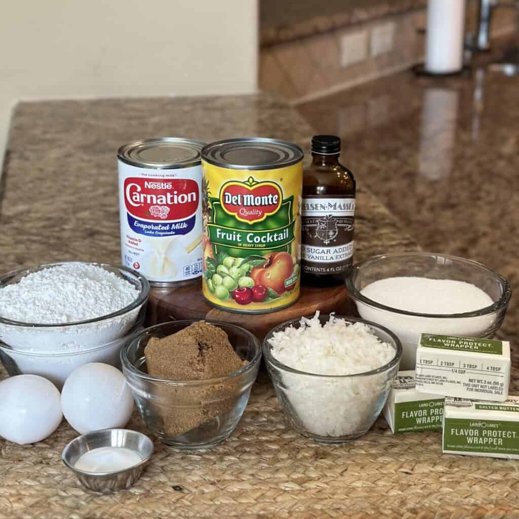 The ingredients to make fruit cocktail cake.