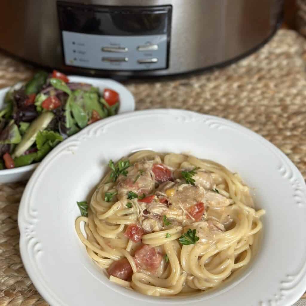 A plate of crock pot chicken spaghetti recipe.