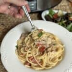 A plate of crock pot chicken spaghetti recipe.