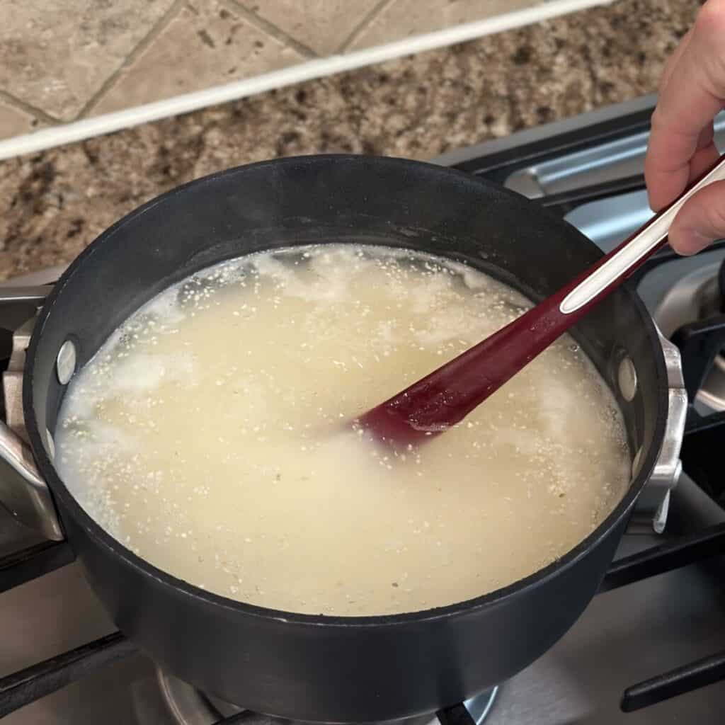 Cooking grits in a pot.