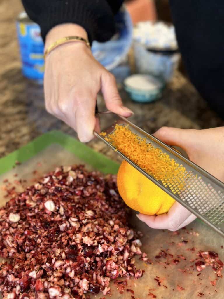 Zesting an orange.