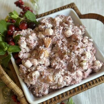 A bowl of cranberry fluff salad.