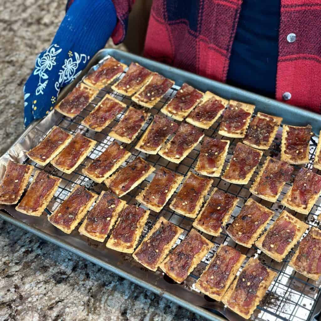 Bacon crackers on a rack on a sheet pan..