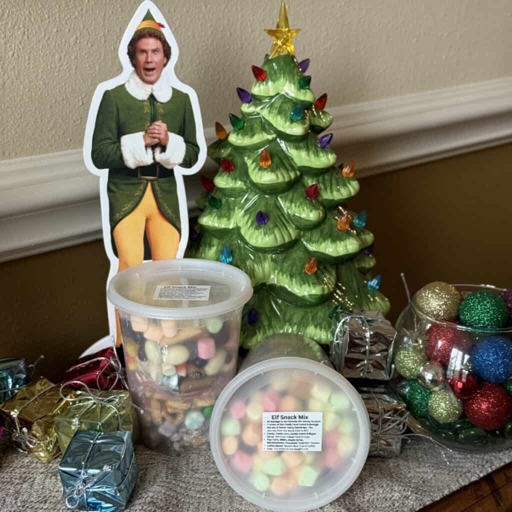 Holiday Elf Snack Mix in plastic containers.