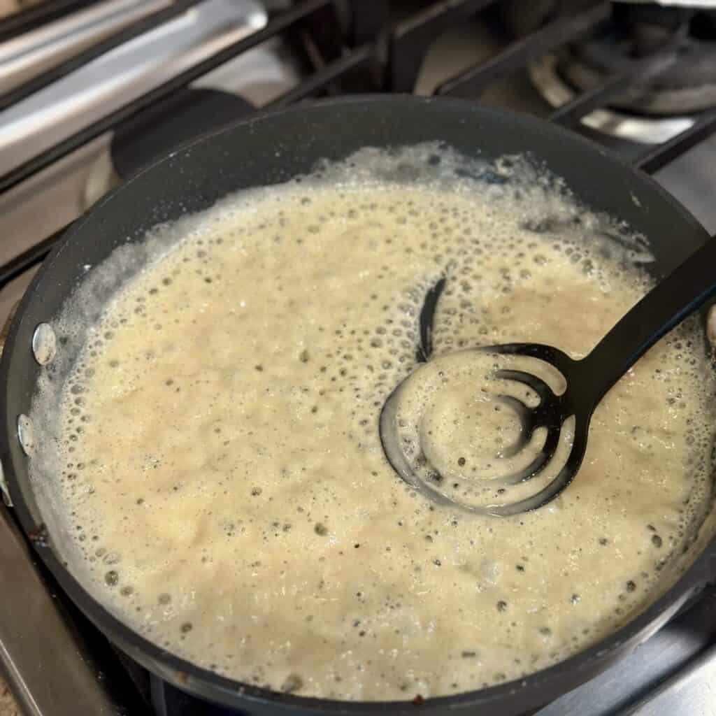 Making a roux in a pan.