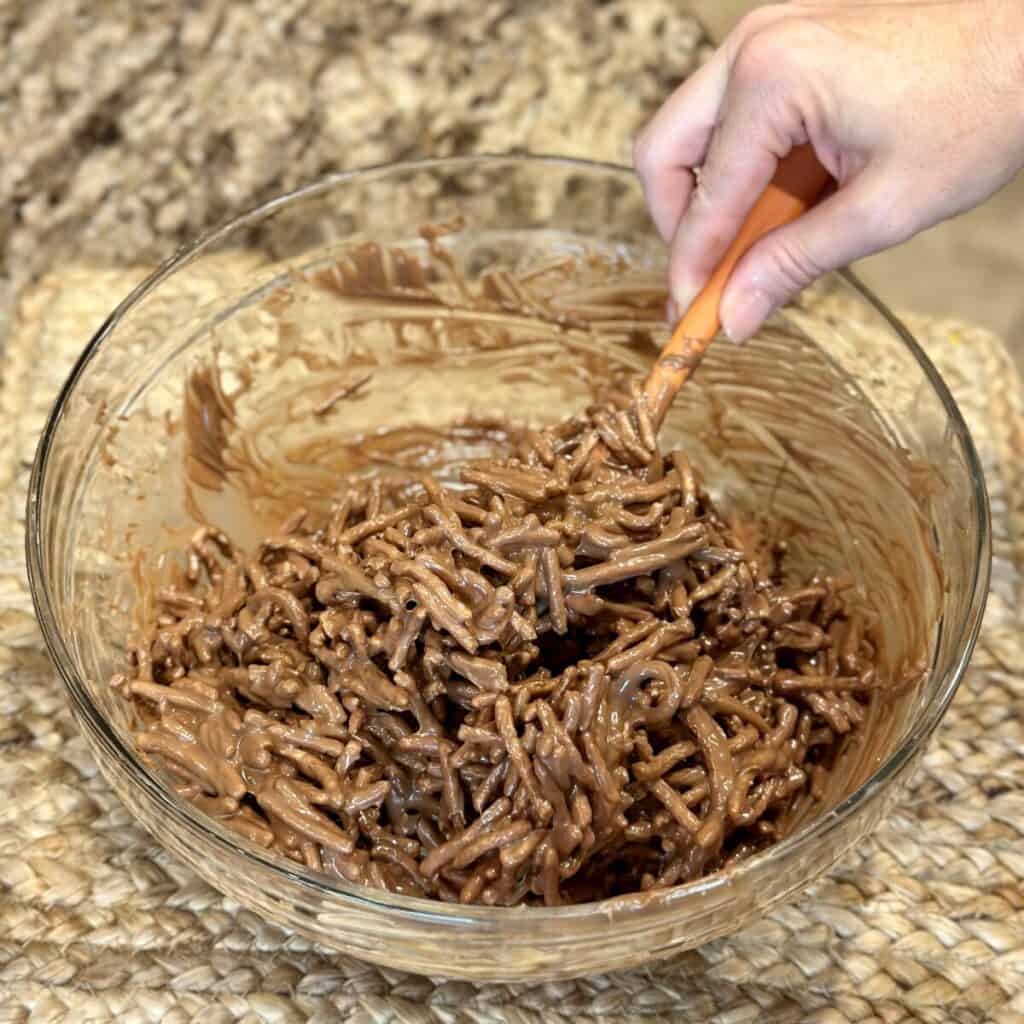 Ingredients in a bowl for haystack cookies.