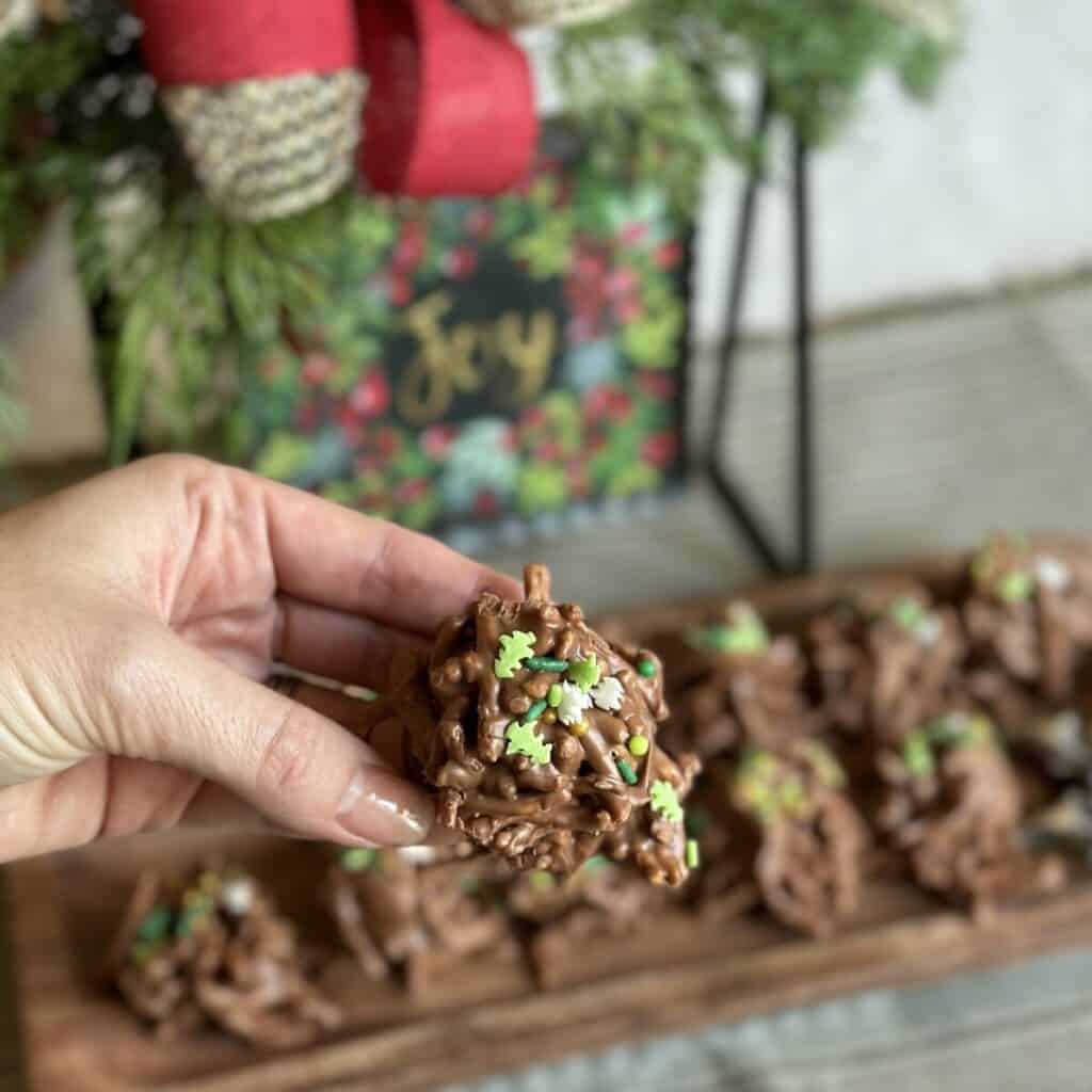 Holding a haystack cookie.