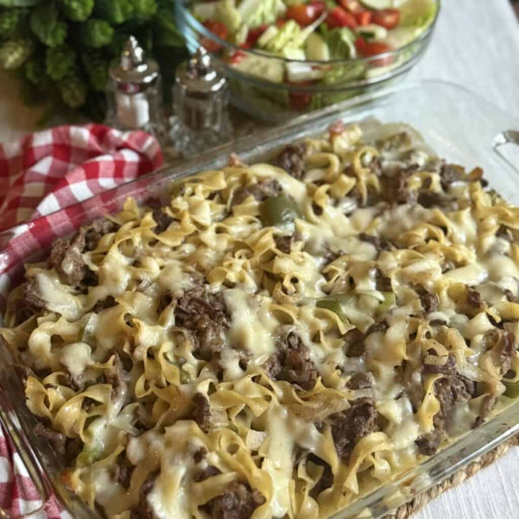 A casserole dish of philly cheesesteak casserole.