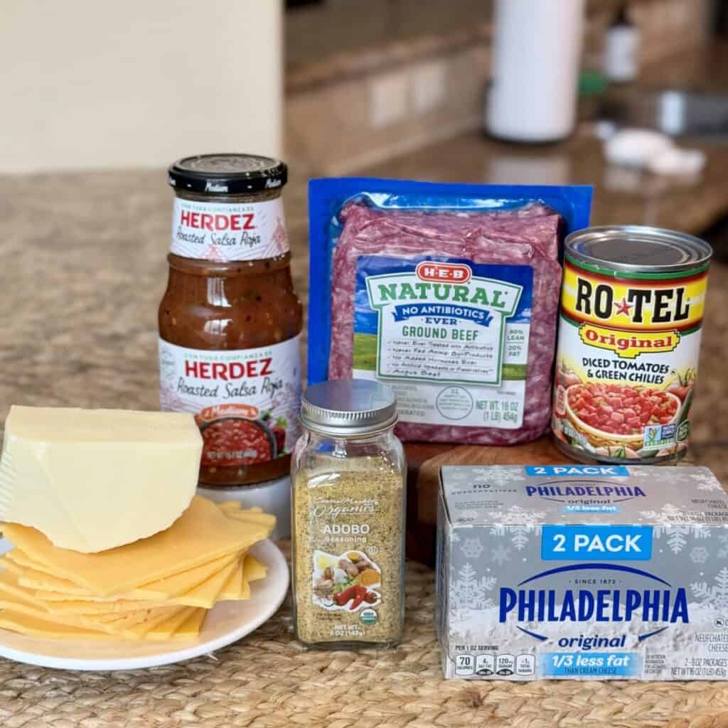 The ingredients to make slow cooker taco dip.