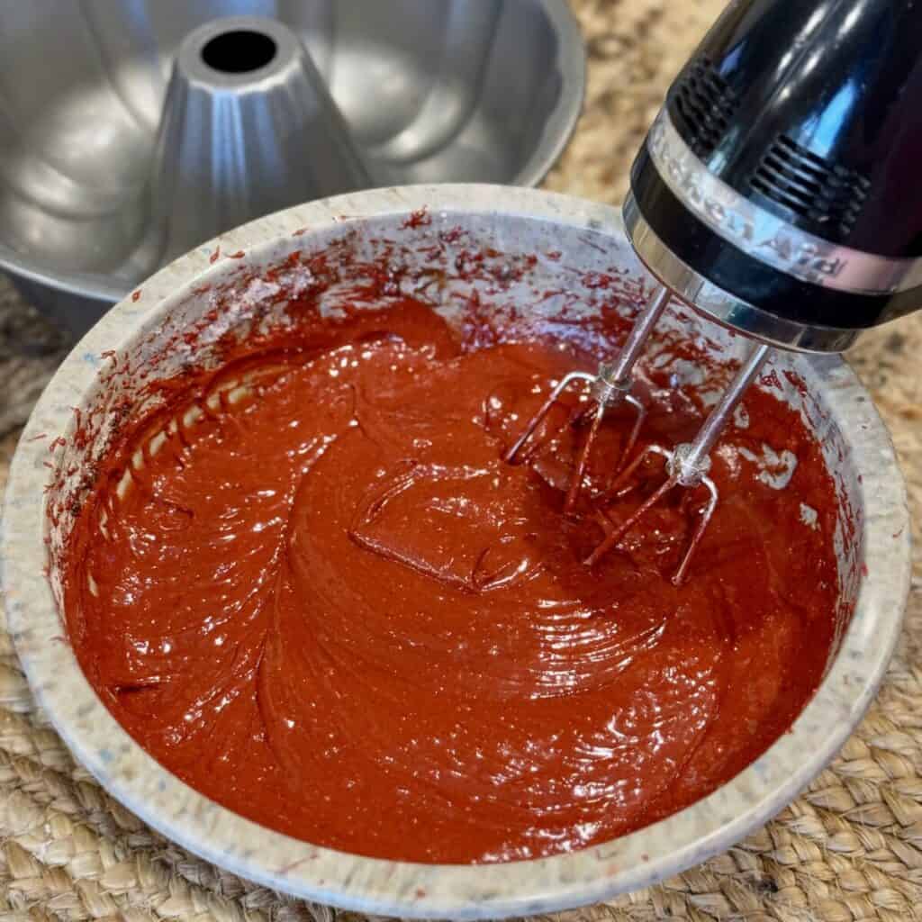 The batter for red velvet cake in a bowl.