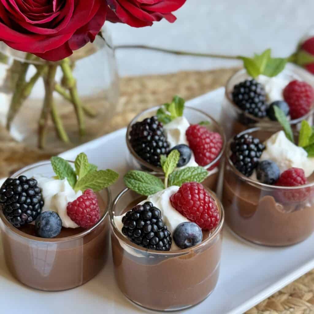 Ramekins of 3 ingredient chocolate mousse.