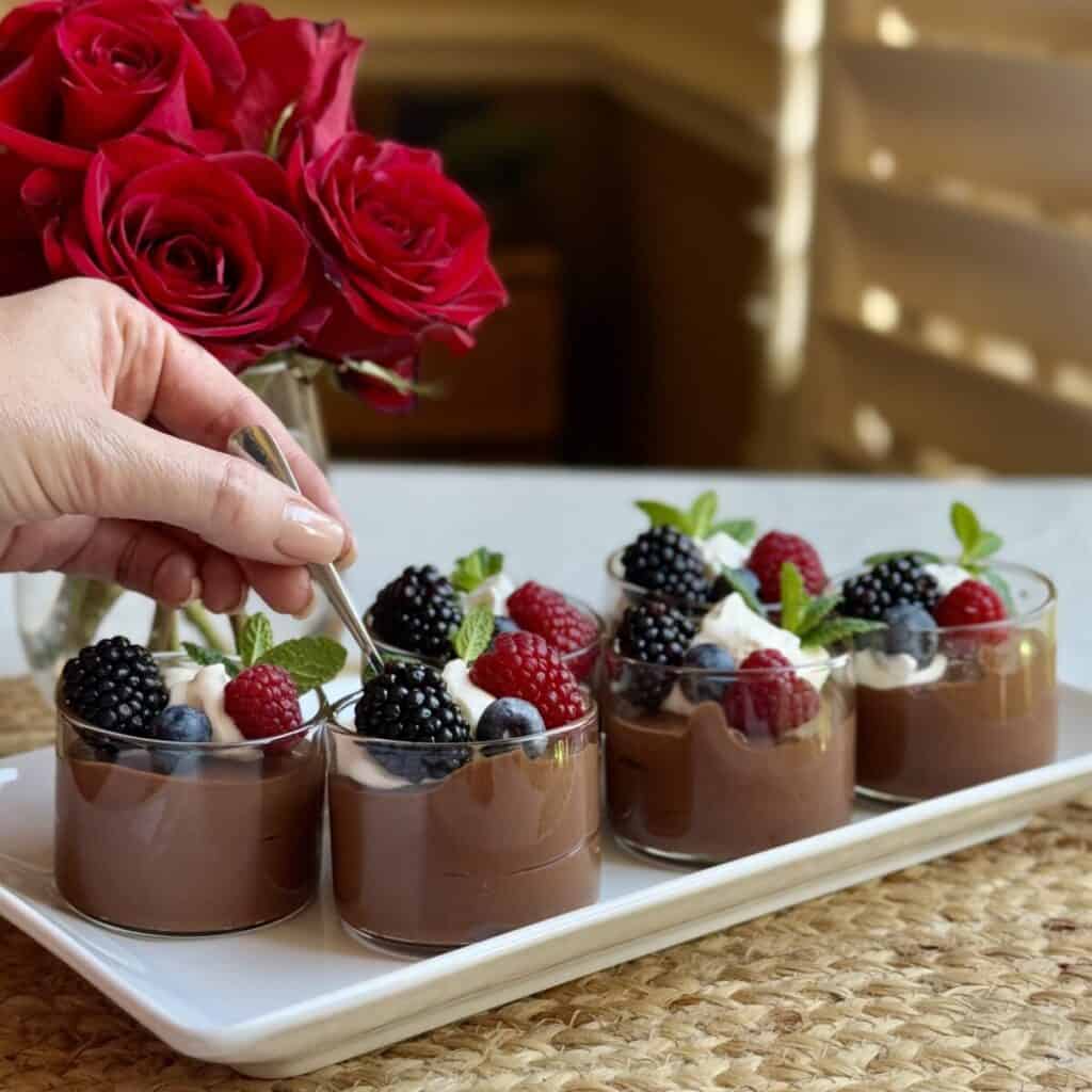 Ramekins of 3 ingredient chocolate mousse.