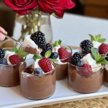 Ramekins of 3 ingredient chocolate mousse.