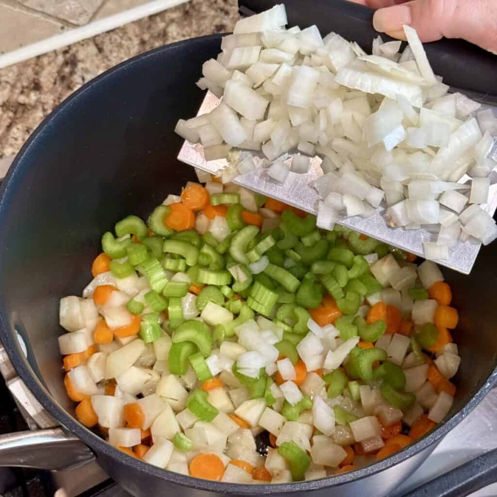 Cooking vegetables in a stockpot.