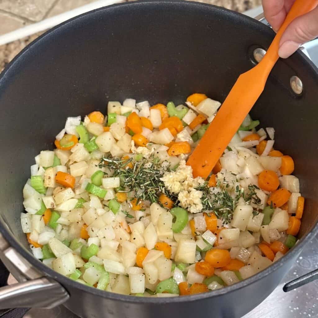 Cooking vegetables in a stockpot.