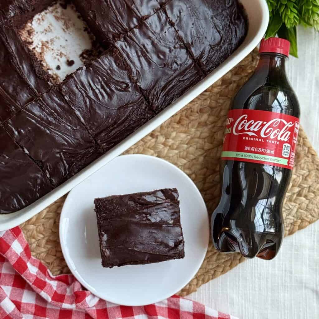 A slice of copycat Cracker Barrel coca-cola cake on a plate.