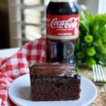 A slice of copycat Cracker Barrel coca-cola cake on a plate.