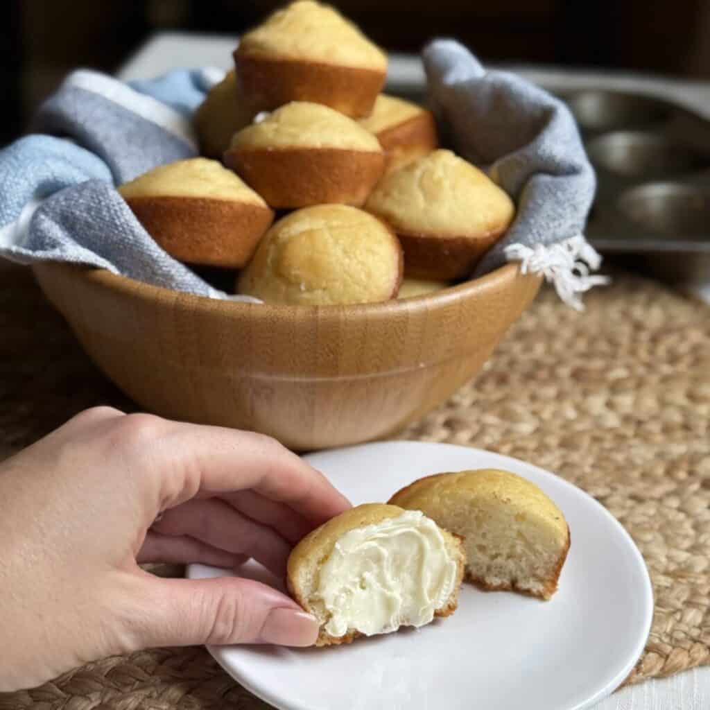 A buttered halved yeast roll.