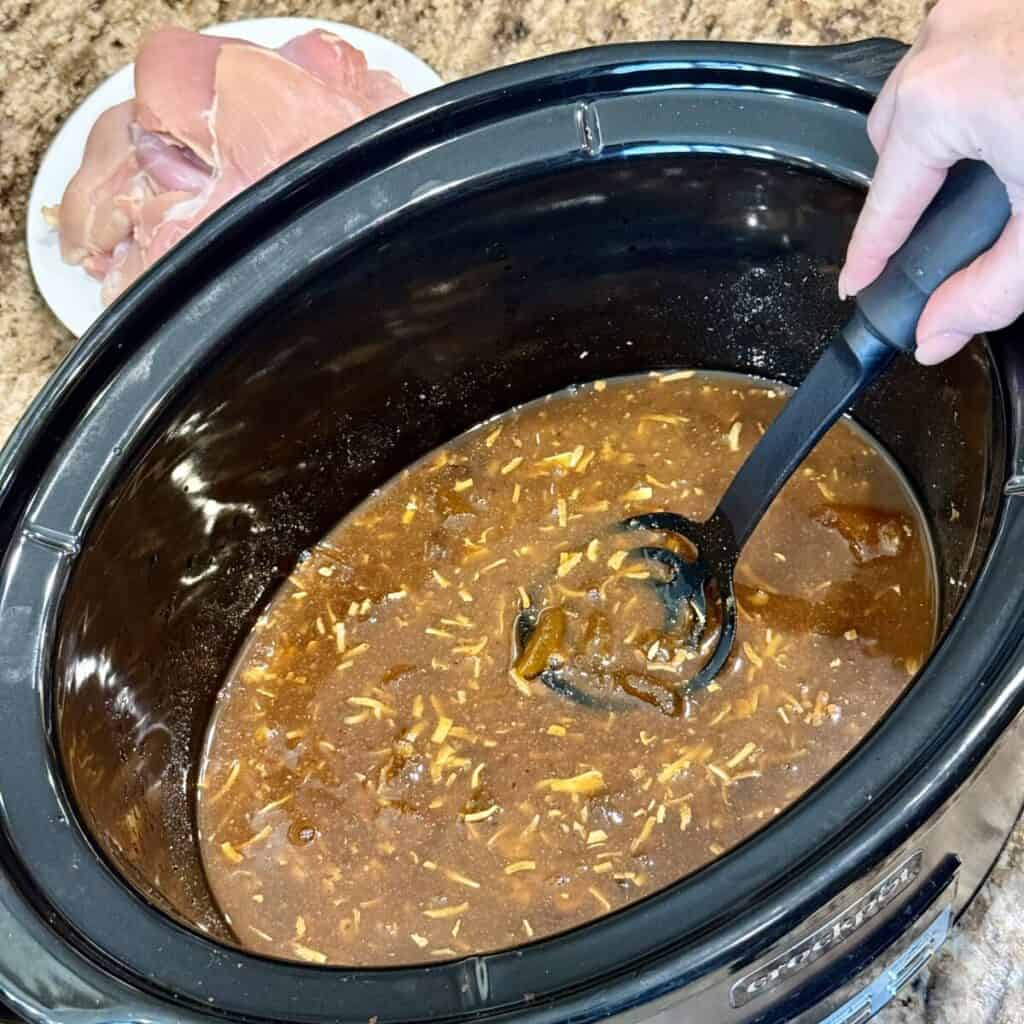 The ingredients to make slow cooker apricot chicken.